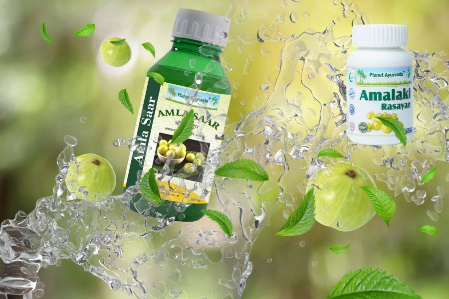 Amla Saar and Amalaki Rasayan products with amla fruits, leaves, and water splashes, symbol of natural vitamin C and antioxidant support benefits.